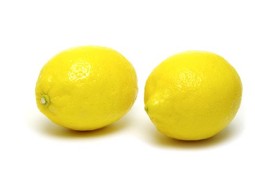 yellow fresh lemons isolated on a white