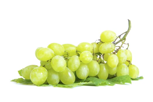 fresh grape fruits with green leaves isolated on white background