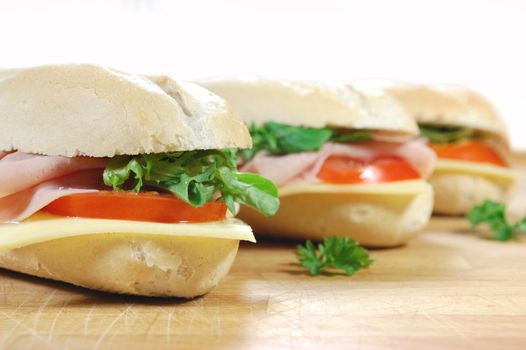 Sub sandwich baguettes with ham and cheese