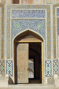 Historic gate to madrassa Miri Arab, Bukhara, Uzbekistan