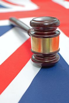 Gavel on top of a UK flag