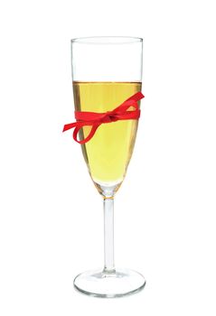 Champagne glass tied with a red ribbon bow 