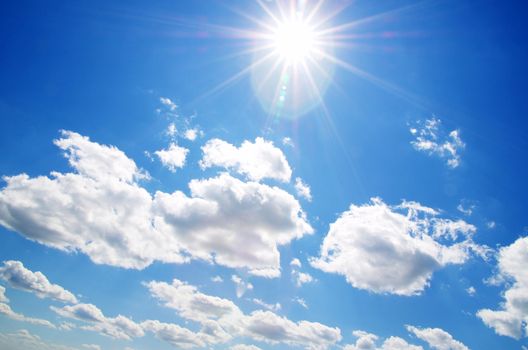 blue sky background with tiny clouds