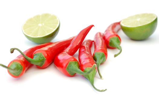 Sliced lime and red chilli peppers