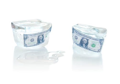 Dollar notes trapped inside frozen ice cubes