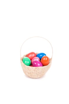 Easter colored eggs in the basket