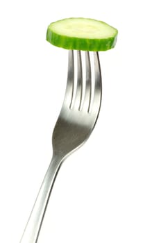 fresh cucumber on a fork