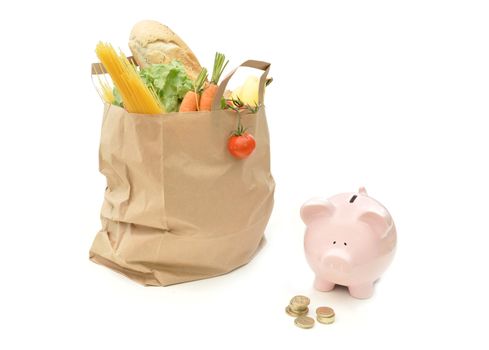 Bag packed with fruit, vegetables and bread 