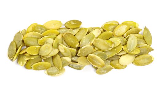 fresh pumpkin seeds isolated on a white