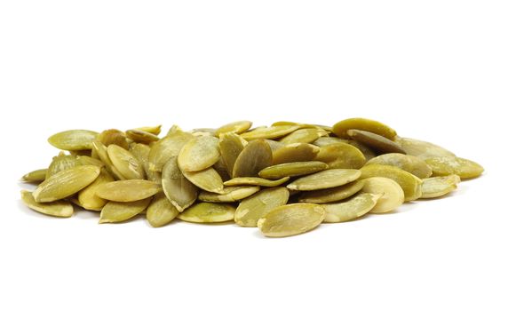 fresh pumpkin seeds isolated on a white
