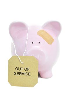 Out of service label attached to a piggybank