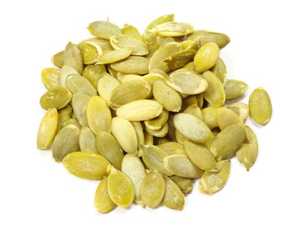 fresh pumpkin seeds isolated on a white