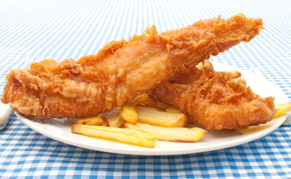 Traditional english fish and chips takeaway meal