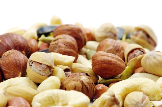 Assorted mixed nuts on white background