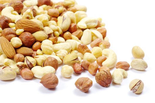 Assorted mixed nuts on white background