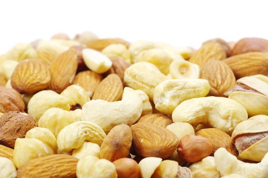 Assorted mixed nuts on white background