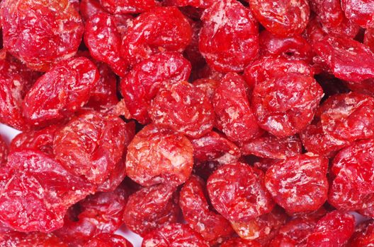 red dried goji berries on white