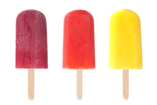 Three different flavored ice lollies over a white background
