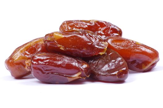 dryed dates on white background