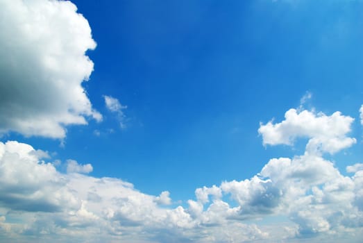 blue sky background with tiny clouds