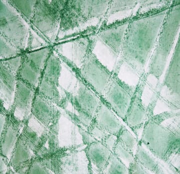 Abstract watercolor background with colorful green layers on paper texture