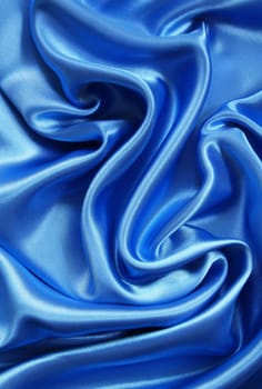 Smooth elegant dark blue silk can use as background 