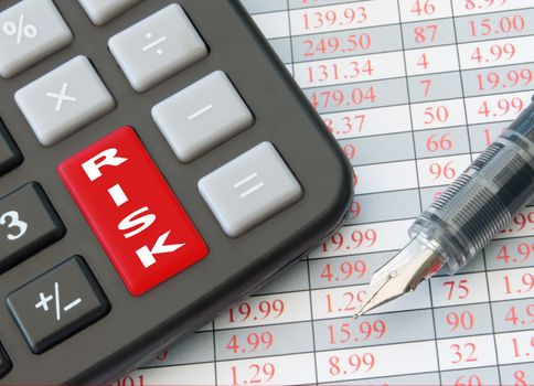 Enter key of a calculator entitled risk with data sheet