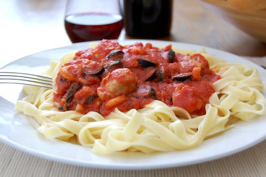 Delicious pasta dish with chicken and tomato basil sauce