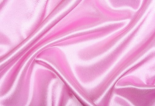 Smooth elegant pink silk as background 