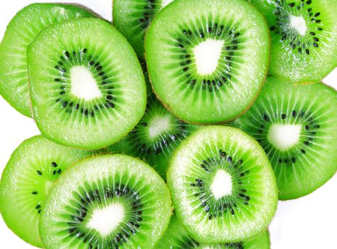 Green kiwi slices isolated on white can use as background 
