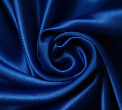 Smooth elegant dark blue silk can use as background 