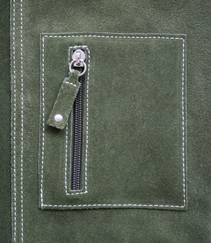 Pocket on green leather texture can use as background 