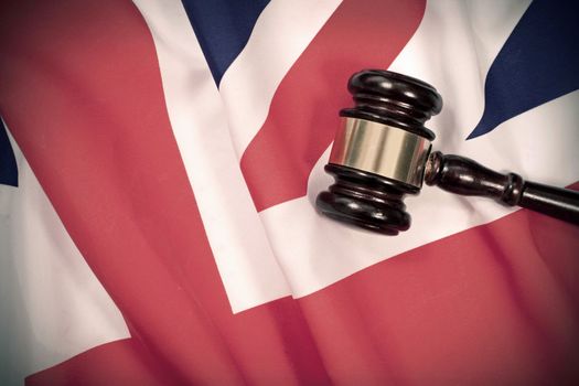 Gavel on top of a British flag