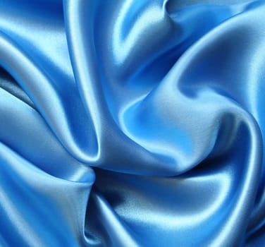 Smooth elegant dark blue silk can use as background 