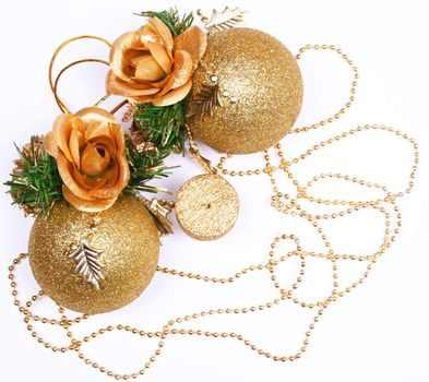 Christmas card with golden balls and candle on white 