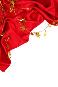 Smooth Red Silk with golden stars can use as holiday background 