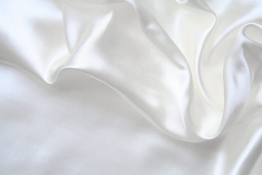 Smooth elegant white silk can use as wedding background 