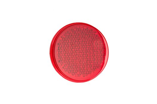 Red, blue, and yellow round reflectors isolated on white background.