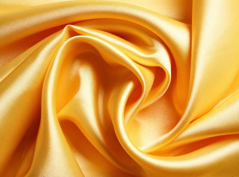 Smooth elegant golden satin can use as background 
