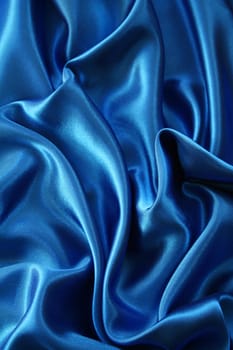 Smooth elegant blue silk can use as background 
