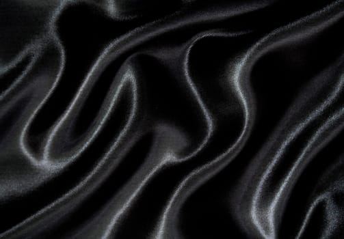 Smooth elegant black silk can use as background 