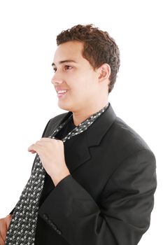 An young man fixing his tie