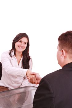 Two businesspeople, or business person and client handshaking at office