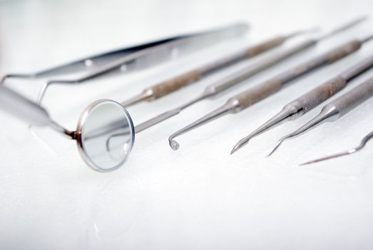 close up dental instruments 
      
.shallow DOF