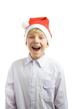 Christmas boy in a red hat. Isolated on white.