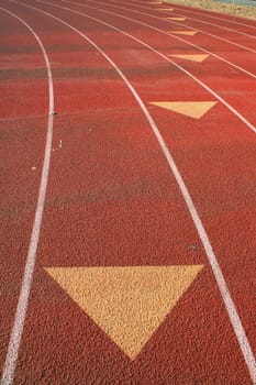 Close up of arrows on running lanes.
