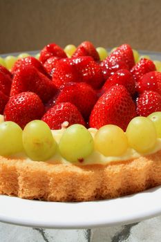 Close up of a fruit cake on a plate.
