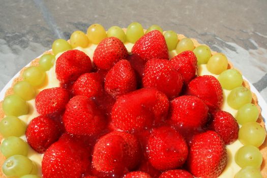 Close up of a fruit cake on a plate.
