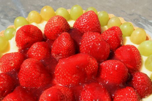 Close up of a fruit cake on a plate.
