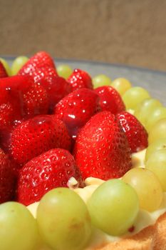 Close up of a fruit cake on a plate.

